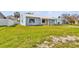 Charming single-story home with a well-manicured front lawn at 16004 2Nd E St, Redington Beach, FL 33708