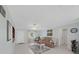 Airy living room with ample natural light and neutral colors at 16004 2Nd E St, Redington Beach, FL 33708