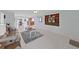 Spacious living room features tile floors and a built-in display shelf at 16004 2Nd E St, Redington Beach, FL 33708