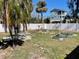 The spacious backyard offers garden beds, privacy fencing and lush, tropical landscaping at 2656 44Th S St, Gulfport, FL 33711
