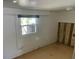 Basement room featuring a window and painted block wall at 2656 44Th S St, Gulfport, FL 33711