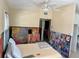 Bright bedroom featuring a ceiling fan and unique wall art, ready for personalization at 2656 44Th S St, Gulfport, FL 33711