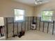 Inviting bedroom with natural light from two windows, offering a blank canvas for customization at 2656 44Th S St, Gulfport, FL 33711