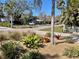 Residential neighborhood showcasing lush greenery, mature palm trees, and well-kept landscaping at 2656 44Th S St, Gulfport, FL 33711