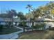 Charming one-story villa with walkway, landscaping, and well-maintained grounds at 2765 Countryside Blvd # 106, Clearwater, FL 33761