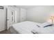Cozy bedroom with carpet and a glimpse into the hallway at 2839 Gumbo Limbo Dr, Wimauma, FL 33598