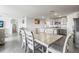 Open dining room connecting to the kitchen, with seating for six and plenty of natural light at 2839 Gumbo Limbo Dr, Wimauma, FL 33598