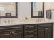 Bathroom with a double sink vanity featuring modern fixtures and undermount sinks at 445 13Th Ne Ave, St Petersburg, FL 33701