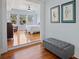 Spacious bedroom with hardwood floors, a ceiling fan, and lots of natural light streaming through the windows at 445 13Th Ne Ave, St Petersburg, FL 33701