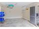 Spacious garage with overhead storage and built-in shelving, providing ample room for vehicles and organization at 445 13Th Ne Ave, St Petersburg, FL 33701