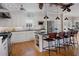 Spacious kitchen with white cabinets, stainless steel appliances, and a large island with seating at 445 13Th Ne Ave, St Petersburg, FL 33701