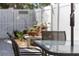 Outdoor dining set with a metal table and chairs on a brick patio area at 445 13Th Ne Ave, St Petersburg, FL 33701