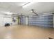 Spacious garage with epoxy flooring and two garage doors, providing ample parking and storage space at 4564 Juniper Dr, Palm Harbor, FL 34685