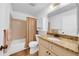 Bathroom featuring a shower tub combination, toilet and vanity at 4647 Lake Villa Dr, Clearwater, FL 33762
