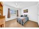 Bedroom with tile floors, a ceiling fan, and a window at 4647 Lake Villa Dr, Clearwater, FL 33762