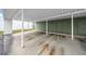 Open carport structure featuring designated storage units and a clean, functional design at 4647 Lake Villa Dr, Clearwater, FL 33762