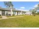 Well-kept townhome exteriors offer pleasant landscaping, providing a welcoming and comfortable atmosphere at 4647 Lake Villa Dr, Clearwater, FL 33762