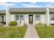 Charming single-story home featuring a well-manicured lawn and inviting front entrance at 4647 Lake Villa Dr, Clearwater, FL 33762