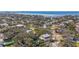 An aerial shot showcasing neighborhood homes with beautiful waterfront views, blending residential charm and scenic beauty at 5010 W Dickens Ave, Tampa, FL 33629