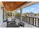 Covered balcony with outdoor seating at 5010 W Dickens Ave, Tampa, FL 33629