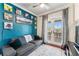 Comfortable bedroom with light and view to balcony at 5010 W Dickens Ave, Tampa, FL 33629