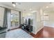 Additional bedroom with television and view to balcony at 5010 W Dickens Ave, Tampa, FL 33629