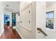 Hallway with access to bedrooms and a balcony at 5010 W Dickens Ave, Tampa, FL 33629