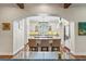 Modern kitchen featuring a central island, white cabinetry, and stainless steel appliances at 5010 W Dickens Ave, Tampa, FL 33629