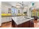 Gourmet kitchen featuring a large island, custom cabinetry, and stainless steel appliances at 5010 W Dickens Ave, Tampa, FL 33629