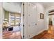 Office with neutral color, hardwood flooring, natural light and colorful rug at 5010 W Dickens Ave, Tampa, FL 33629