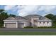 Charming single-story home with a three-car garage and beautifully manicured lawn at 7934 Lakes Edge Ln, Port Charlotte, FL 33981