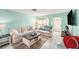 Bright and airy living room with comfortable seating and decor for a relaxing atmosphere at 8341 Moulton Dr, Port Richey, FL 34668