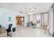 Bright living space with an office nook and views into the kitchen at 8341 Moulton Dr, Port Richey, FL 34668