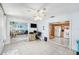 Open living space with a glimpse of the kitchen and Gathering room at 8341 Moulton Dr, Port Richey, FL 34668