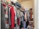 Walk-in closet equipped with extensive shelving for optimal storage of clothing at 100 4Th S Ave # 109, St Petersburg, FL 33701