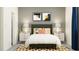 Inviting bedroom showcases stylish decor, a cozy bed with stylish pillows and a patterned rug at 11870 Sparkling Topaz Cv, Parrish, FL 34219