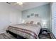 This spacious bedroom is decorated with a coastal theme and has a view of the beach at 1216 S Missouri Ave # 411, Clearwater, FL 33756