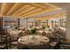 Elegant ballroom with tables set, offering ocean views and a sophisticated ambiance at 15000 Madeira Way # 512, Madeira Beach, FL 33708