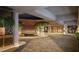 Grand hotel entrance featuring a water feature, lush greenery, and clear signage at 15000 Madeira Way # 512, Madeira Beach, FL 33708