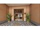Elegant foyer showcasing decorative tile, lighting, and comfortable seating area with plants at 15000 Madeira Way # 512, Madeira Beach, FL 33708