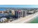 Resort condo building featuring beach access, a swimming pool, and nearby boat marina at 1660 Gulf Blvd # Ph2, Clearwater Beach, FL 33767