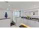 Bright bathroom featuring a glass shower, double vanity, and ocean views at 1660 Gulf Blvd # Ph2, Clearwater Beach, FL 33767