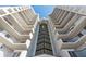Modern high-rise condominium exterior with white balconies and window-lined center at 1660 Gulf Blvd # Ph2, Clearwater Beach, FL 33767