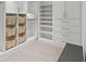 Organized walk-in closet with shelving, drawers, and hanging space at 1660 Gulf Blvd # Ph2, Clearwater Beach, FL 33767