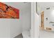 Powder room with wall art at 1660 Gulf Blvd # Ph2, Clearwater Beach, FL 33767