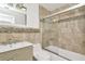 Modern bathroom with tiled shower, glass door, and a contemporary vanity sink at 1740 Coco Palm Cir, Sun City Center, FL 33573