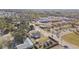 Aerial view of a home and neighborhood with a construction site nearby on a sunny day at 1741 S Martin Luther King Jr Ave, Clearwater, FL 33756