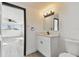 Updated bathroom features a new vanity, stylish fixtures, and modern lighting at 1741 S Martin Luther King Jr Ave, Clearwater, FL 33756