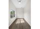 Bright bedroom with wood floors and a sunlit window offering a view of the outdoors at 1931 24Th S St, St Petersburg, FL 33712