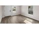 Inviting bedroom featuring wood-look floors and natural light at 1931 24Th S St, St Petersburg, FL 33712